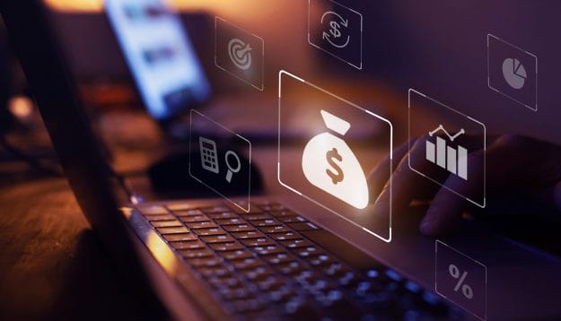 Close-up of hands typing on a laptop with business icons overlay.